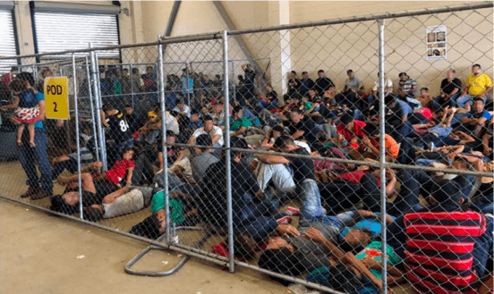 migrant children huddle together in cramped quarters at facility run by the Border Patrol in Donna, Texas