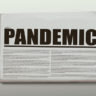 Pandemic written headlined newspaper isolated on a white background